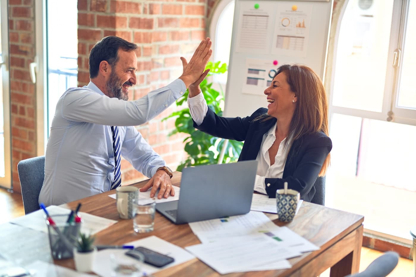 Two people reviewing a product together